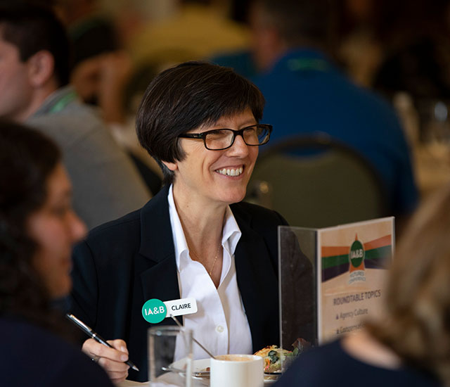 employee seated at table